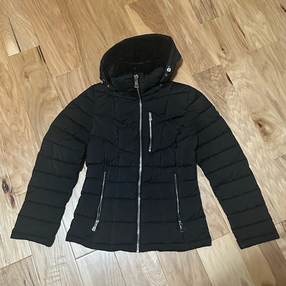 Woman’s Calvin Klein Hooded Black Puffer Jacket, Size Woman’s XS.